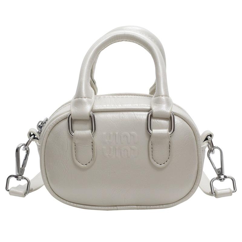 2025 new European and American retro niche trend hand-held lipstick bag versatile solid color high quality casual messenger bag