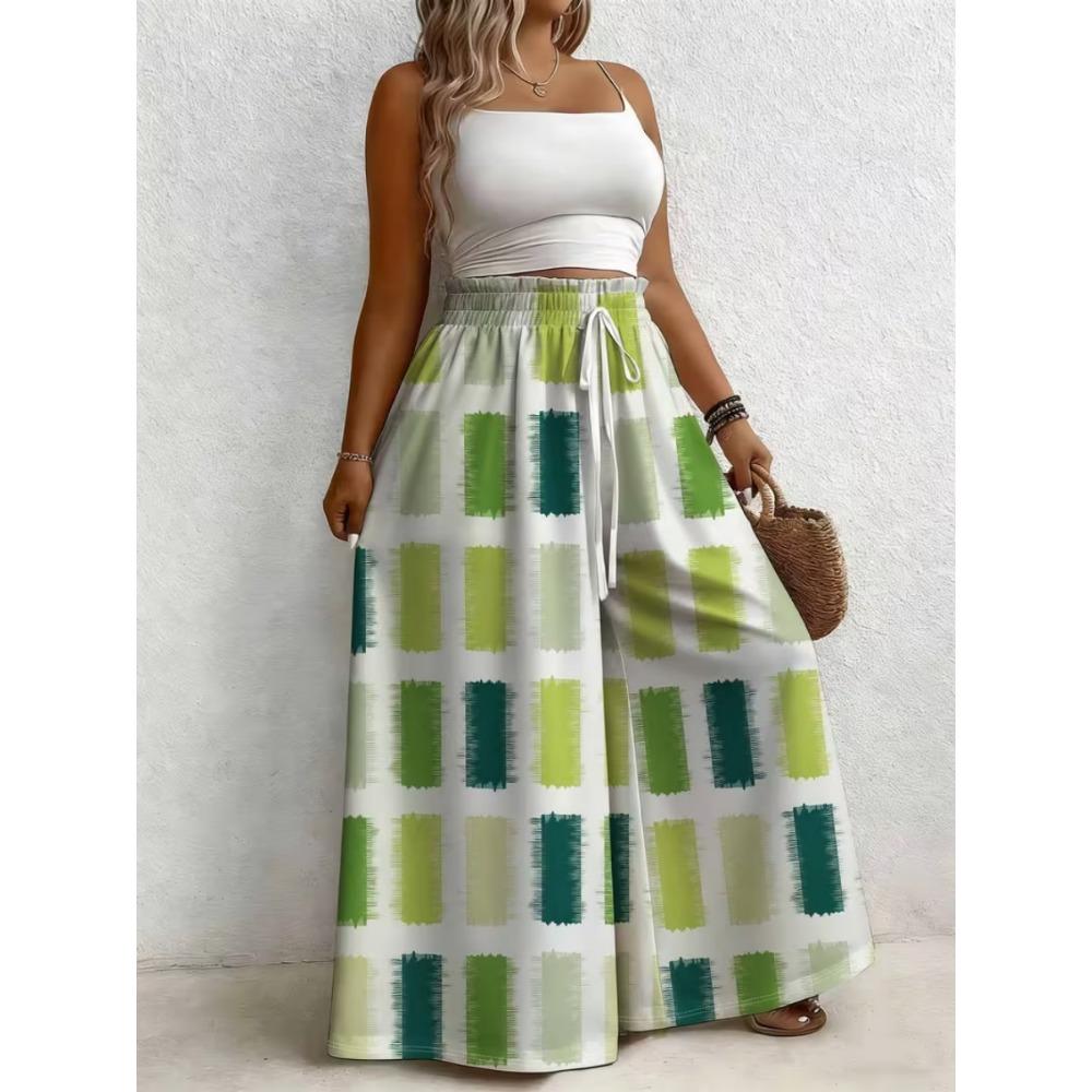 Large size women's printed loose wide leg pants, elegant with pockets, suitable for vacation and daily wear