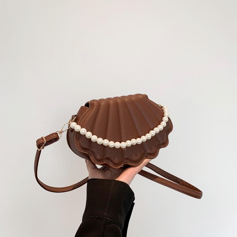 

Трендова особистість нішева перлова сумка жіноча 2024 весна нова модна сумка на плече проста сумка-месенджер сумка-мушля коричневий