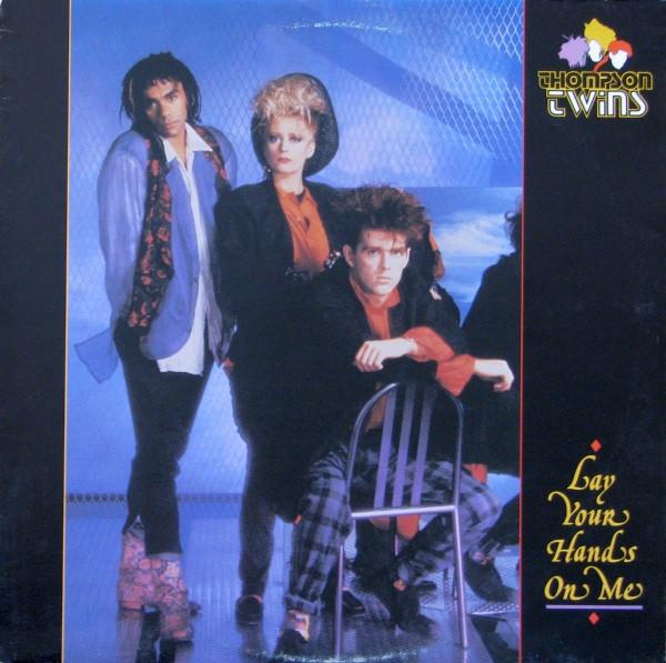 

12-дюймовая пластинка THOMPSON TWINS Lay Your Hands On Me AD19397 Arista 1985 Канада Поп Б/у