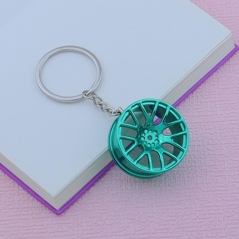 Creative Car Wheel Hub Keychain: Zinc Alloy Metal, Customizable Gift.