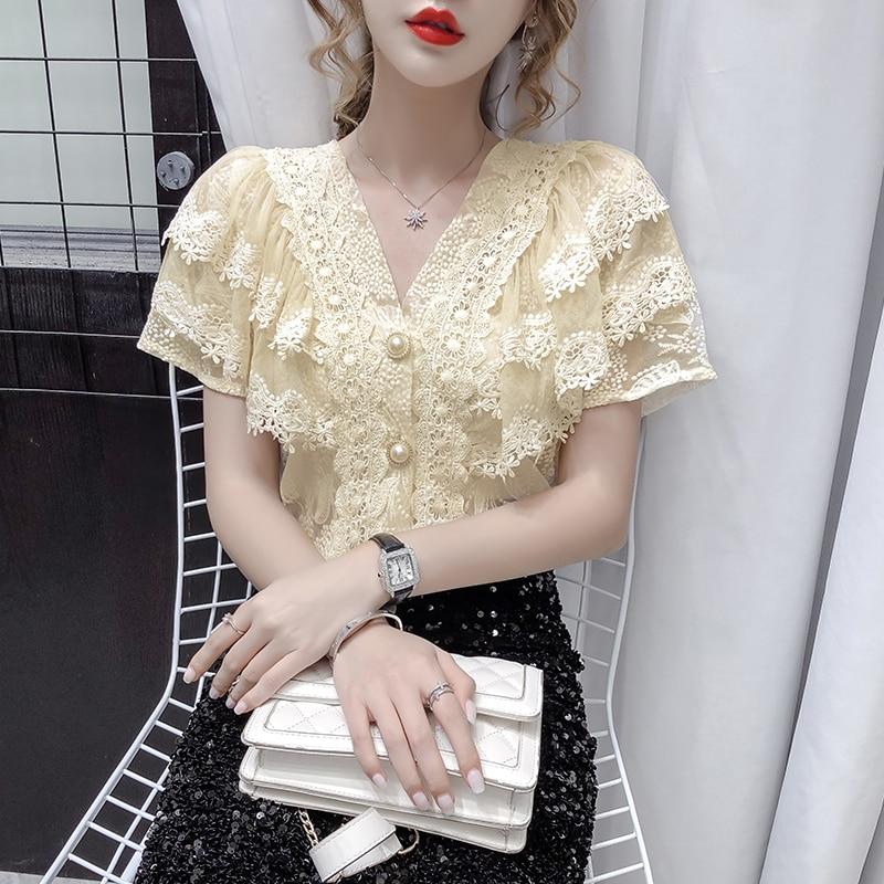 Chemise d'été en dentelle ajourée pour femmes, col en v, volants
