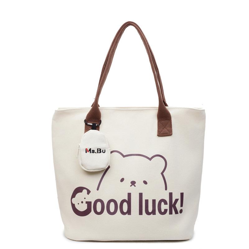 Japanese canvas bag women's shoulder bag 2025 summer new literary style large-capacity simple portable printed canvas bag