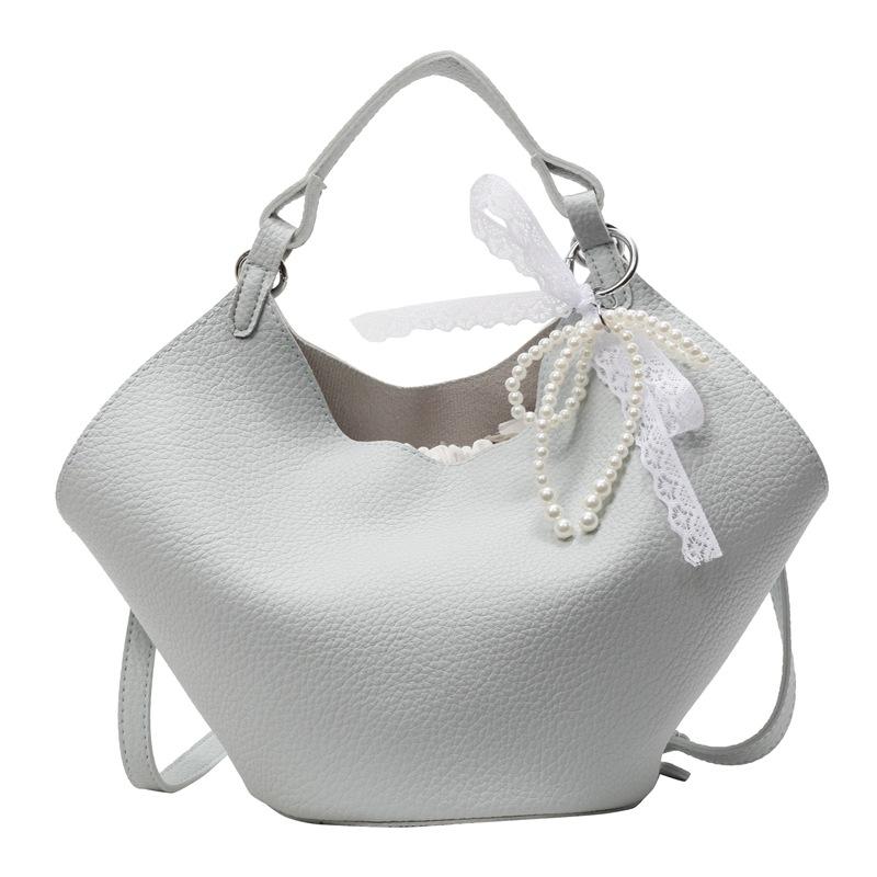 This year, the Korean version of the simple lychee pattern portable mother and child bag is popular, high-end, lightweight and versatile fashion mess