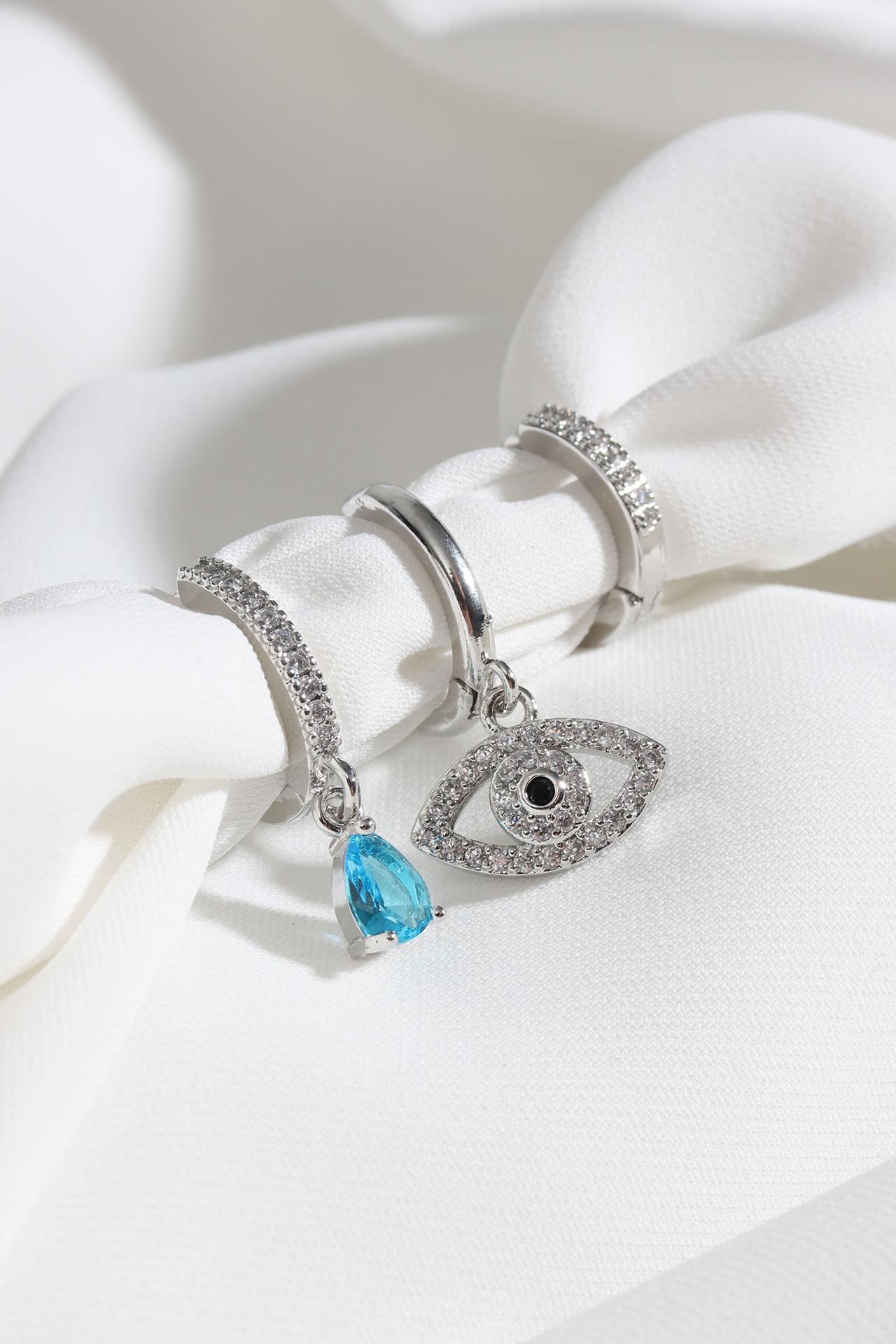 

Серьги серебряного цвета из трех частей с фигурками глаз