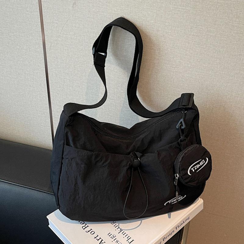 

Canvas bag women s large-capacity new autumn and winter versatile shoulder messenger bag casual commuter dumpling bag чёрный