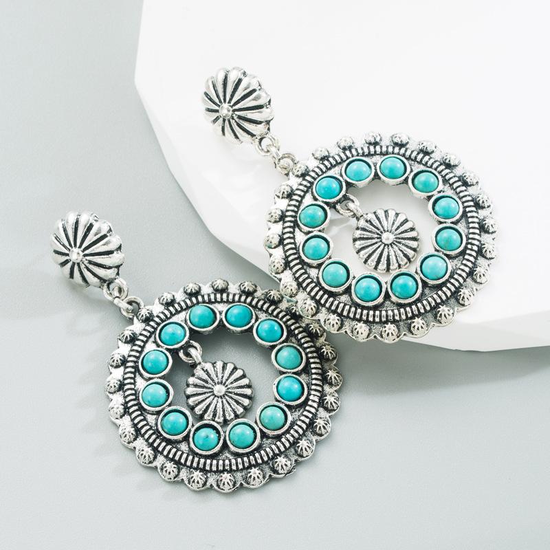 Retro Ethnic Style Earrings with Hollow Round Pendants and Exaggerated Party-style Ear Accessories