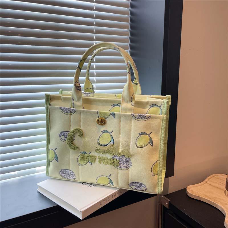 2025 Hot-Selling Large Capacity Canvas Tote: Stylish Commuter & Crossbody Bag.