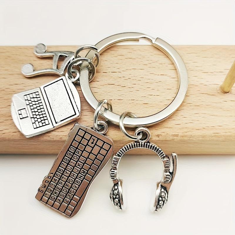 

Musical Note Keychain: Zinc Alloy Laptop, Keyboard, Headphone Charm for Men - Stylish Car Pendant серебряный