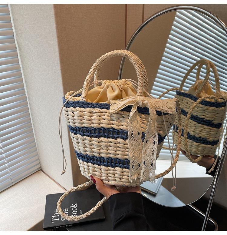 New Woven Bag Women's Spring Niche Design Portable Bucket Bag Crossbody Shoulder Straw Bag