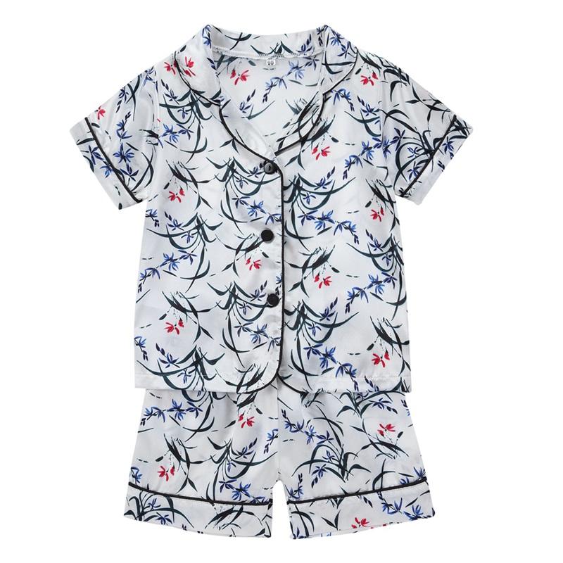 Färgglada pyjamasset med frukt och blommor: Sovkläder i mjukt imiterat siden för barn 1-5 år