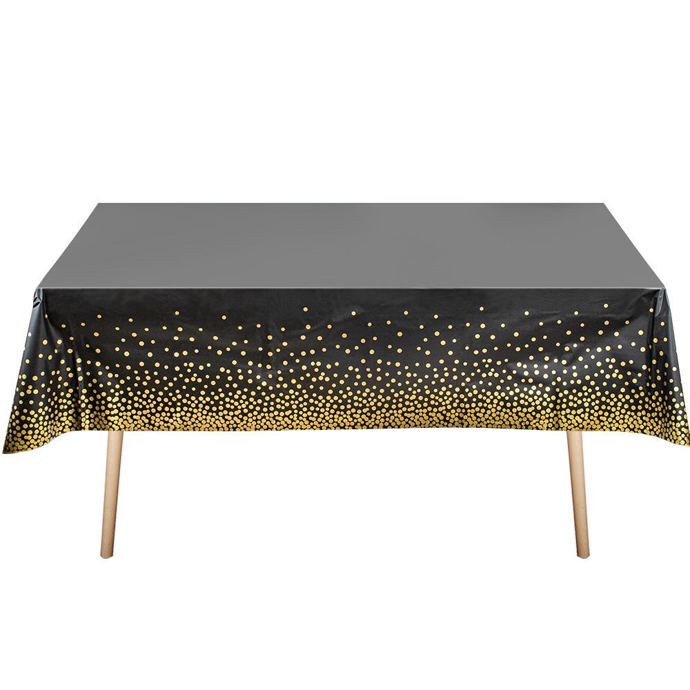 Jednorazowy zestaw talerzyków i kubeczków papierowych z motywem urodzinowym w złote kropki, wraz ze sztućcami