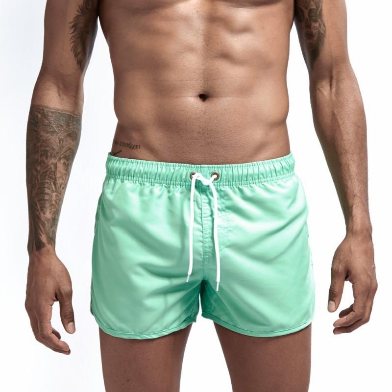 

2023 Unisex Casual Summer Beach Shorts - Lightweight, Loose, Sports-Ready with Custom Logo Option 2XL