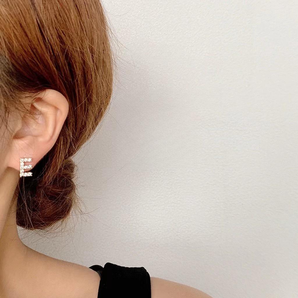 Korean Micro-Diamond Trendy Letter Stud Earrings: Elegant, High-End Accessories for Women's Unique Style.