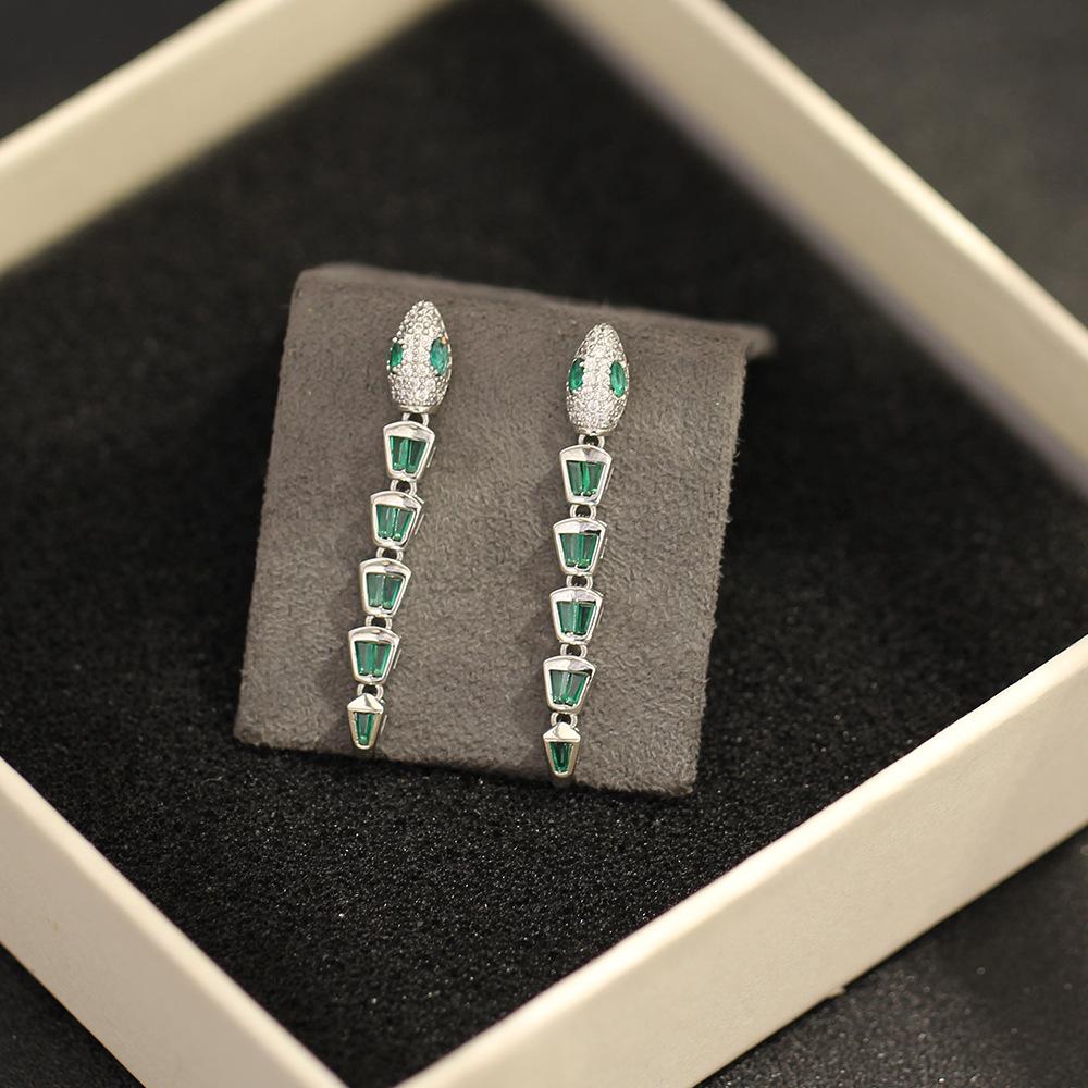 European and American niche stone inlaid green snake earrings temperament versatile fashion gold-plated silver needle earrings stud earrings women's