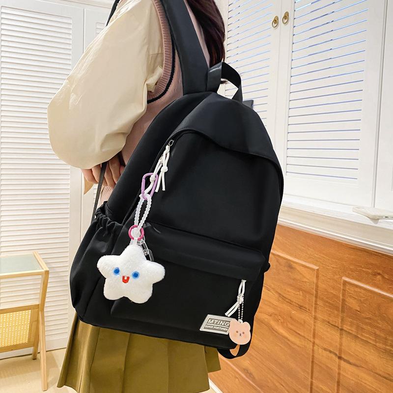 Small fresh girl backpack Japanese solid color schoolbag female Korean version ins versatile large capacity student backpack new