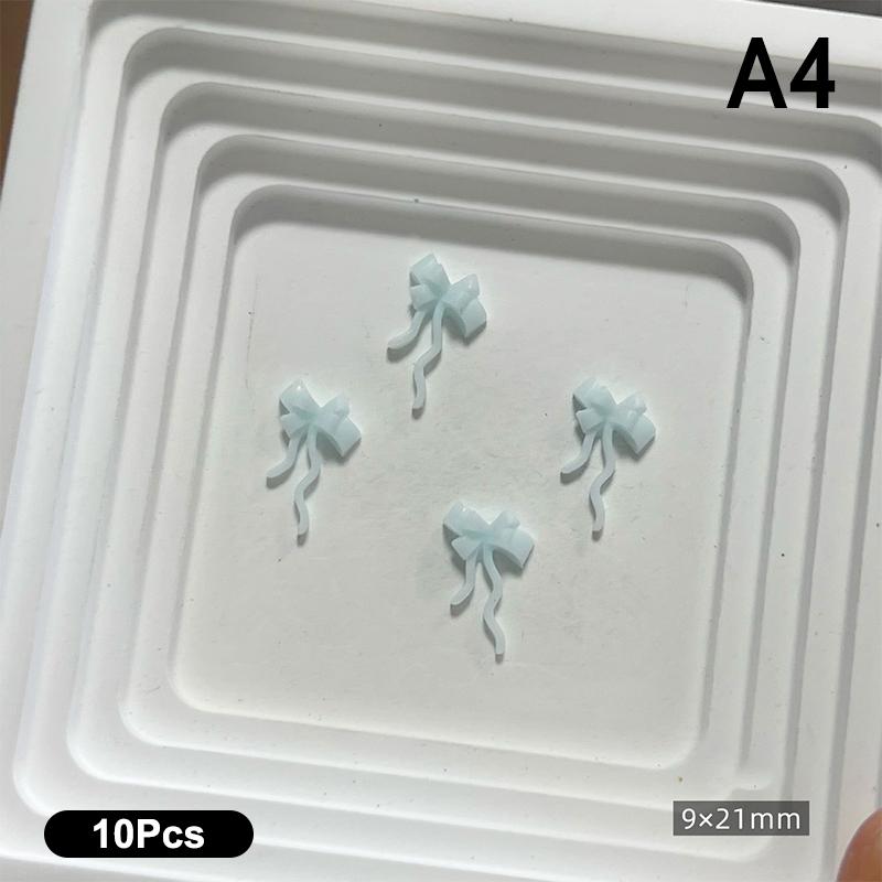10 Stück Doppellagige Schleifen-Nagelanhänger 3D Süße Band-Schleifen Nagelkunst Strasssteine Mini Harz-Fliege Maniküre Schmuck DIY Teile
