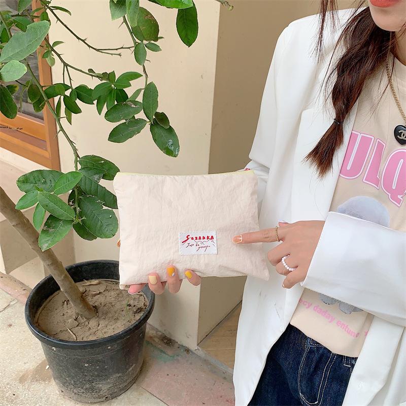 

34221 Spring and summer new color Macaron cosmetic bag portable cute small bag change bag jewelry bag
