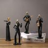  Élégante figurine décorative:  Luxe léger et personnalité pour l'entrée, meuble TV, cave à vin ou décoration de bureau