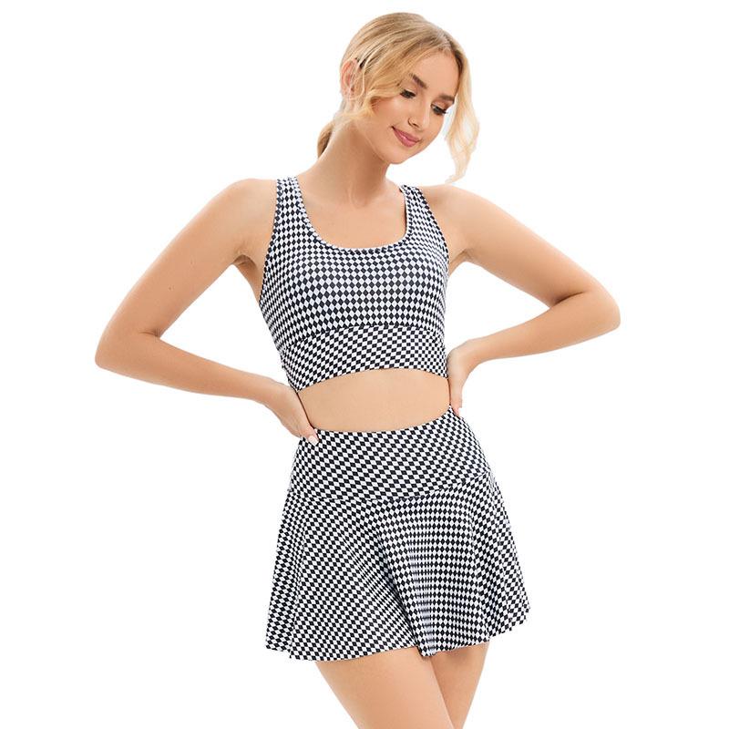 

Женский комплект безрукавного спортивного бюстгальтера и теннисной юбки S