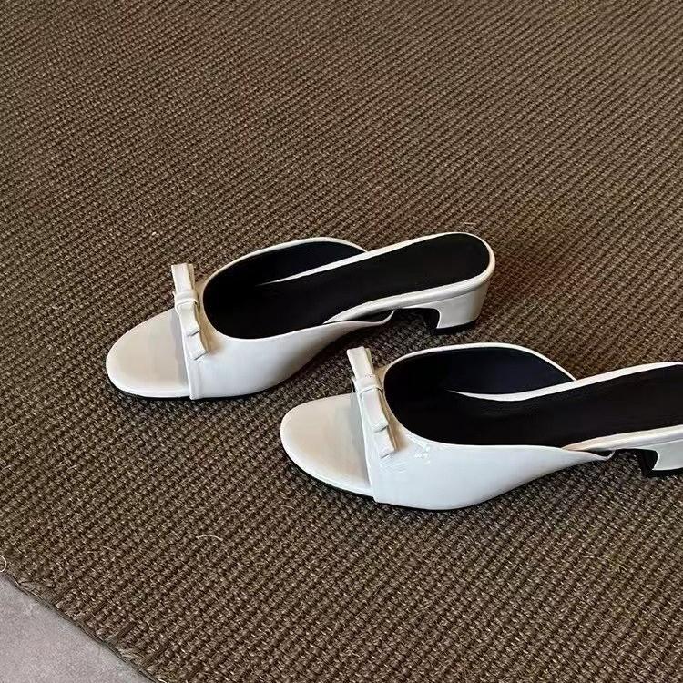 2025 new French patent leather black bow sandals women's versatile simple low-heeled casual open-toed slippers