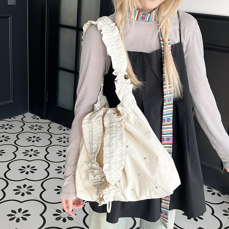 ins Korean version of fashionable small fresh shoulder bag 2025 new literary canvas tote bag versatile pleated shopping bag