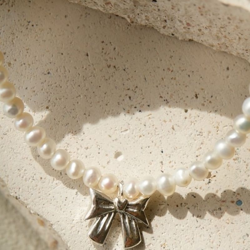 BELLOOGGI Heart Ribbon Pearl Bracelet