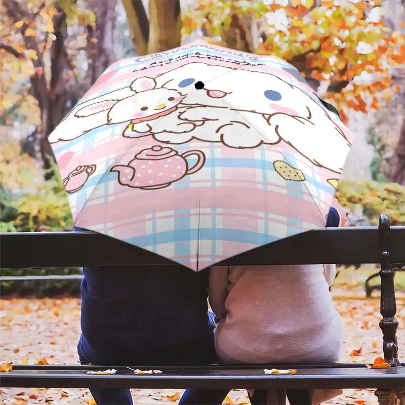 Portable travel umbrella with cute Sanrio character designs, UV-protective folding umbrella.