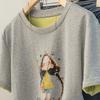 Dam T-shirt med tecknad tryck och kontrastrund hals