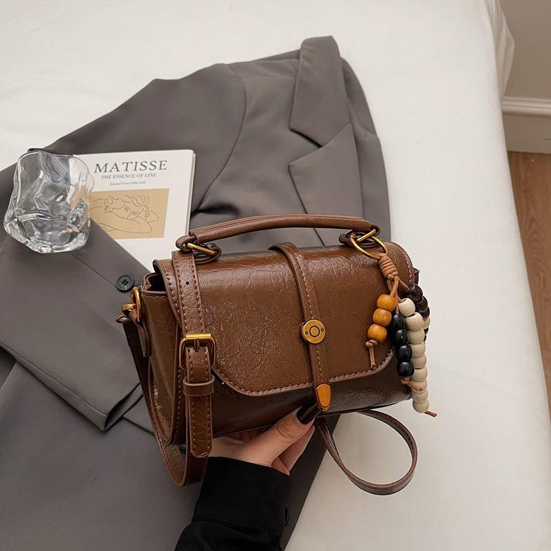 

Niche retro bag women s winter new trendy small square bag fashionable portable messenger bag high value shoulder bag коричневий