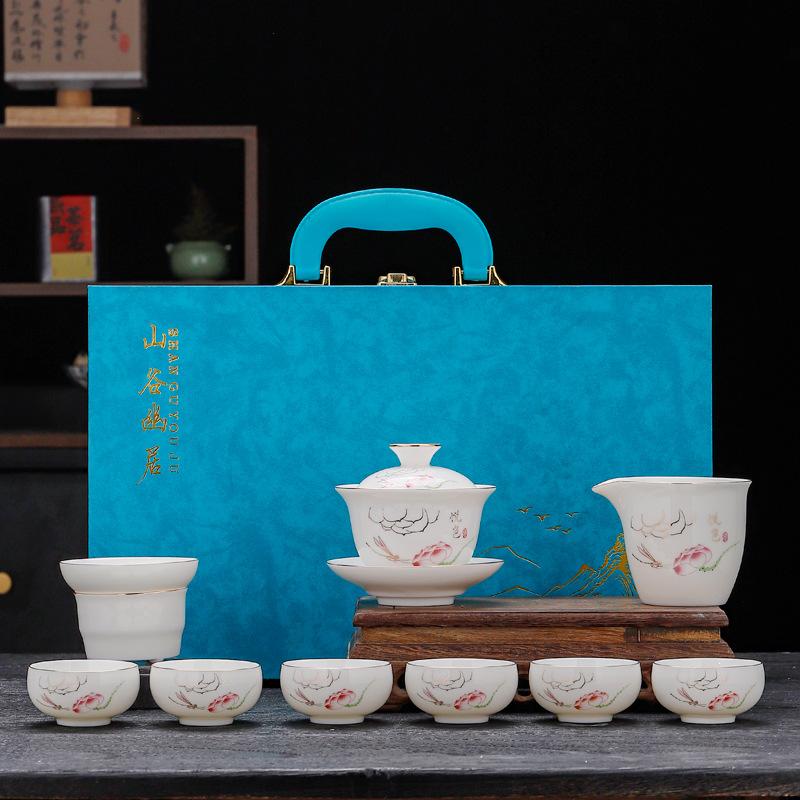 Suet jade white porcelain kung fu tea set household cover bowl teapot tea cup high-end gift box festival gift set