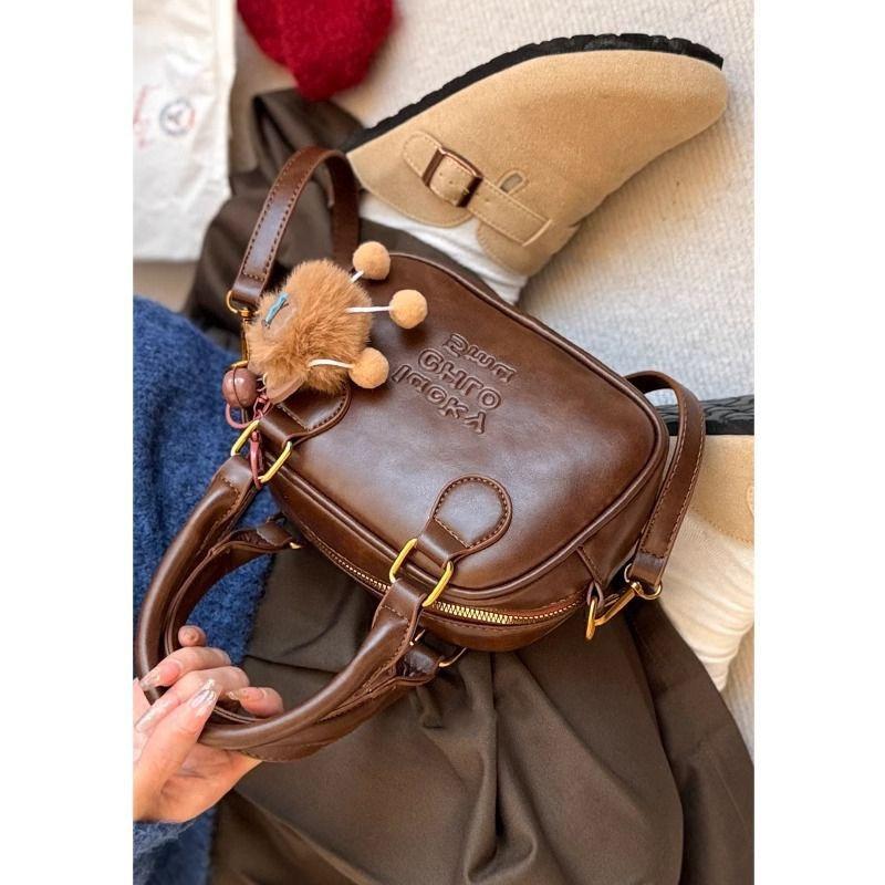 Niche retro bowling bag women's new fashion shoulder messenger bag premium texture coffee handbag