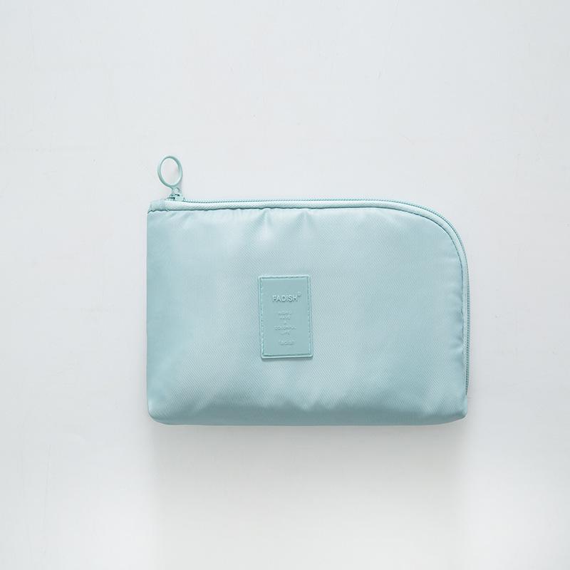 New Multi-functional Travel Storage Bag with Power Bank, Data Cable, Charger, and Makeup Compartments.