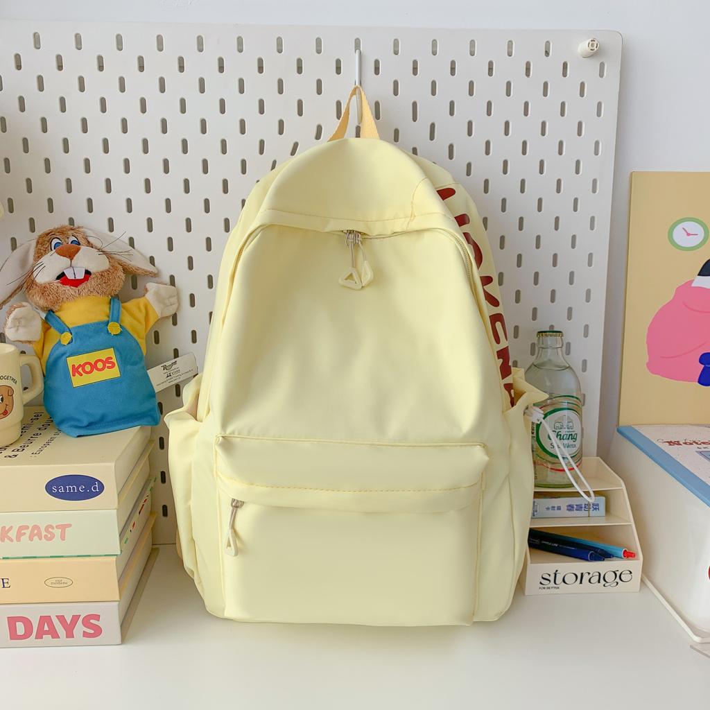 Summer Korean version fresh solid color casual size backpack large capacity primary and secondary school students go out to play small backpack
