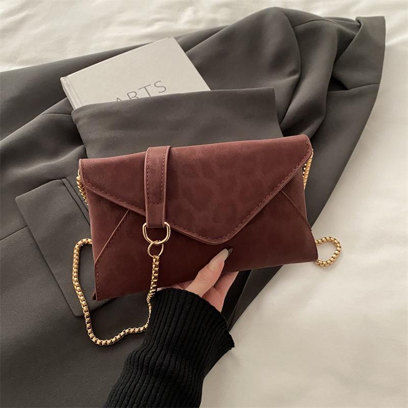 

Fashion leopard print women s clutch bag new simple texture versatile chain oblique span bag envelope bag female червоний