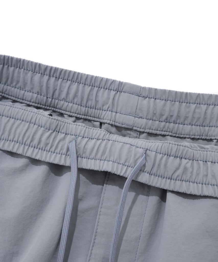 COVERNAT Windbreaker Jogger Pants Light Blue