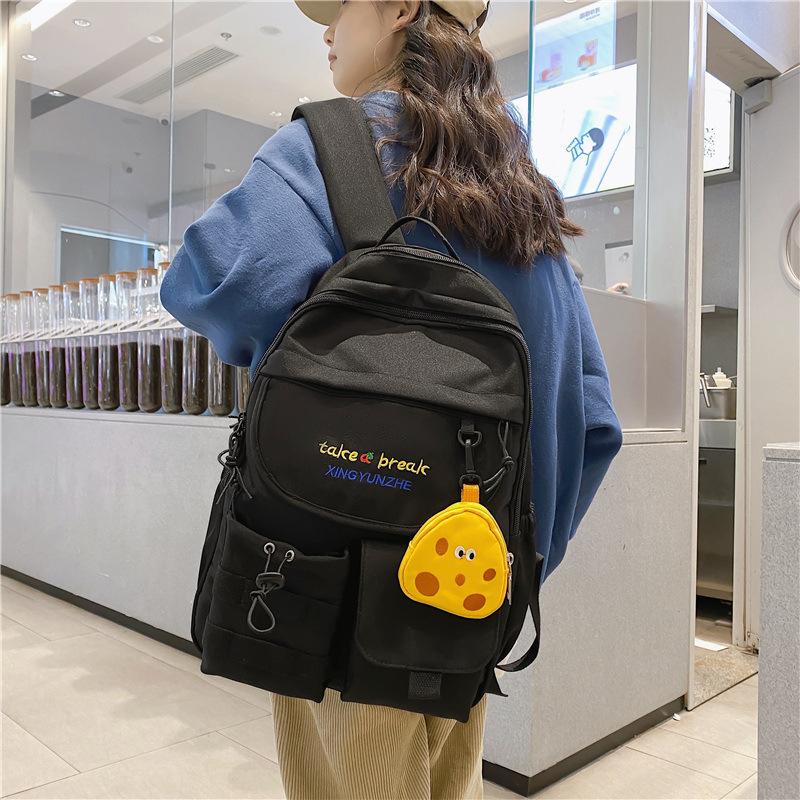 Large-capacity schoolbag female high-value junior high school college student backpack Mori style cute versatile student backpack