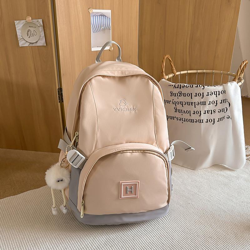 Color Blocked Fashionable Letter Pattern Student Backpack With Pendant Plush