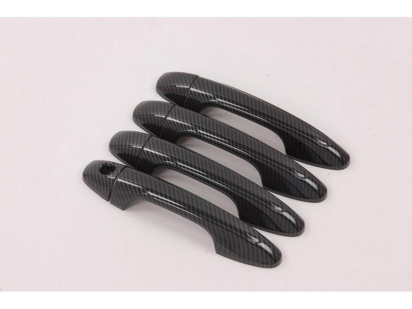 

2019 Yaris Отделка дверных ручек из черного углеволокна 2019 Yaris L