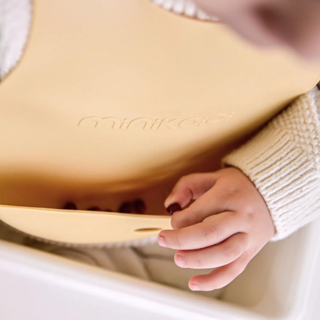 Silicone Bib for Children with Pocket for Dishes Yellow MinikOiOi 1 Pc.