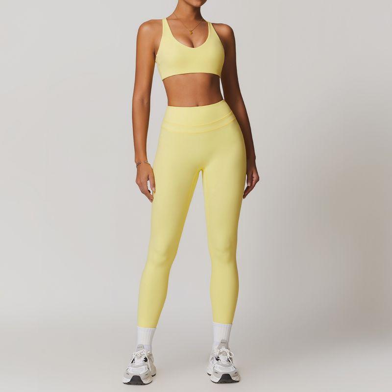 Guangzhou Zechuang Clothing Co., Ltd. Brushed Tight Back Yoga Suit Stretch High Waist Workout Clothes for Women Running