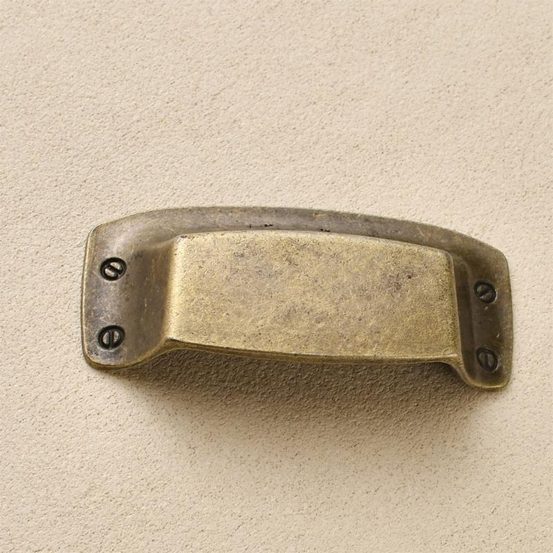 Ergonomic Curvilinear Form Handles for Drawer Entrances Offering Traditional Look and Strong Construction for Residential Application