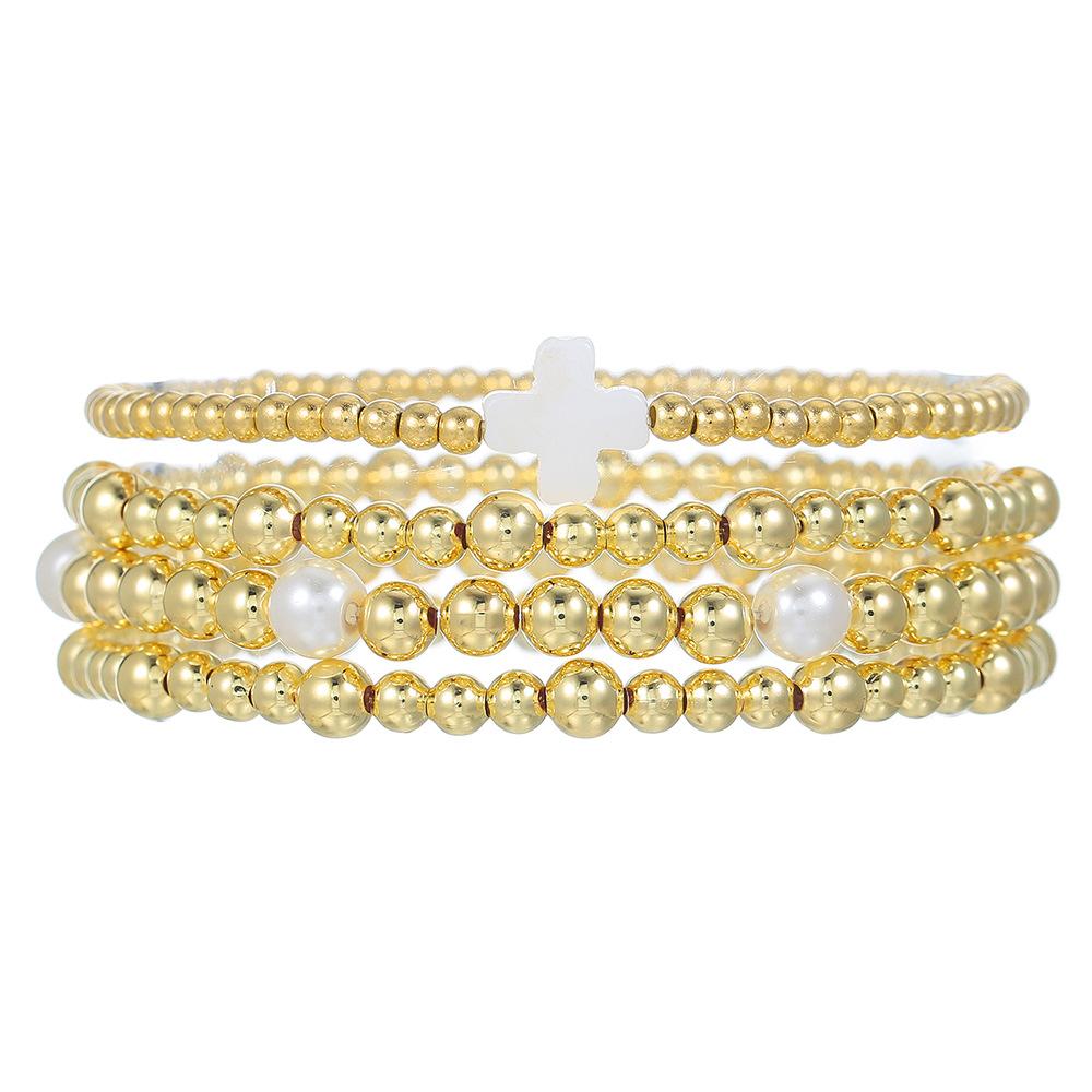 European and American jewelry niche design cross bracelet set sweet cool beaded stacked shell pearl bracelet