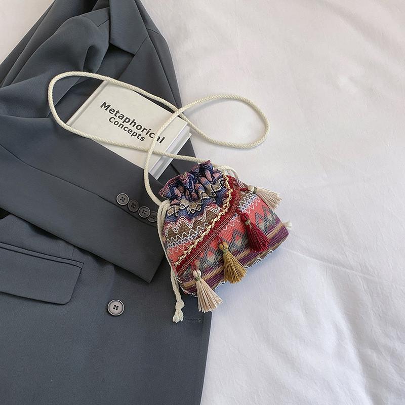 Trendy Stylish Woven Bucket Bag For Women In Vibrant Blue Orange And Red Perfect For Street Fashion