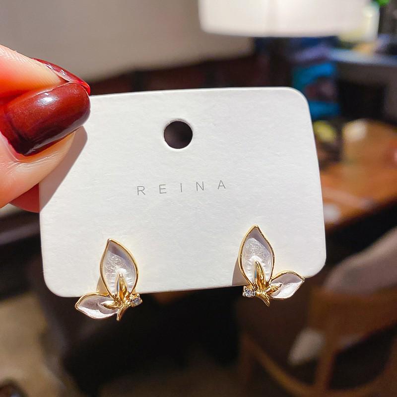 Boucles d'oreilles Fleur Géométrique Élégantes: Clous luxueux et polyvalents pour femmes