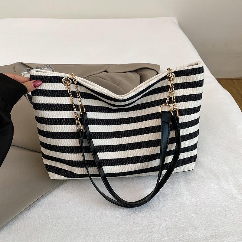 

New striped shoulder tote bag fashion versatile knitted bag handbag lazy versatile women s bag