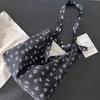 Niche versatile canvas bag shoulder messenger bag black floral printed bag for women