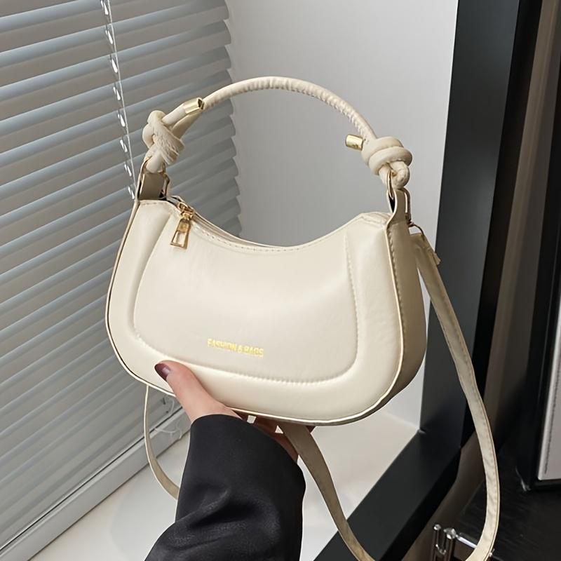 

A Stylish Women S Handbag with A High-Quality Feel, Perfect for Shoulder or Crossbody Wear. брудно-білий