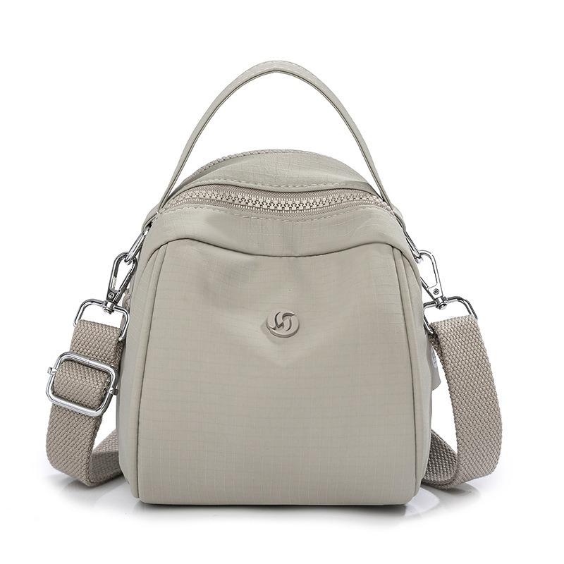 

Summer new simple shell hand shoulder bag nylon cloth lightweight and trendy going out leisure travel crossbody mobile phone bag сірий колір