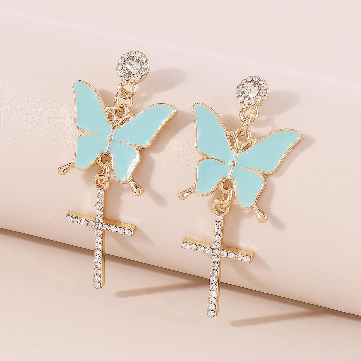 

Блискучі сережки-метелики з китицями та стразами синій